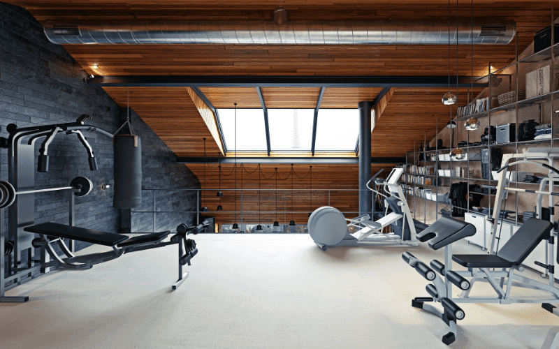 Technicians installing a treadmill and gym equipment in Nashville